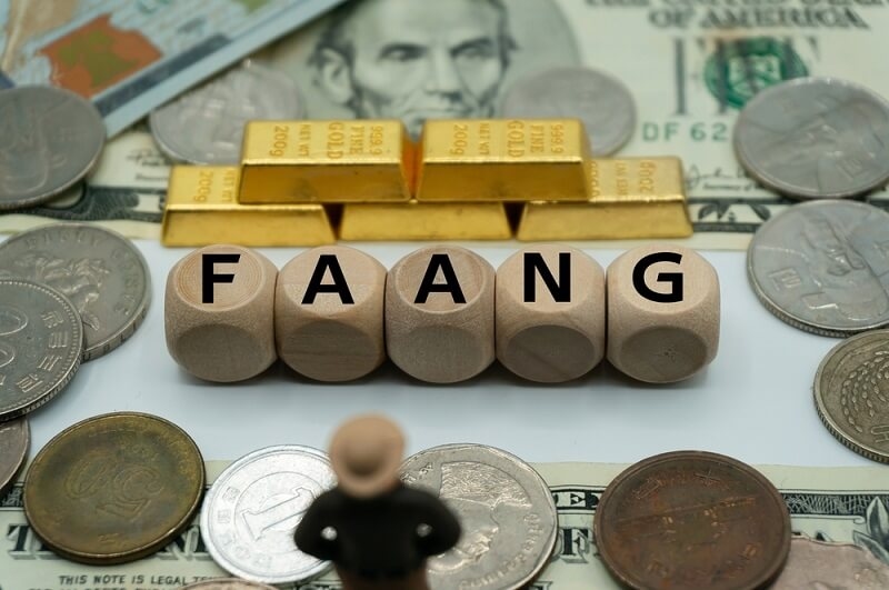 (FAANG) five prominent American technology company written on gold and money background