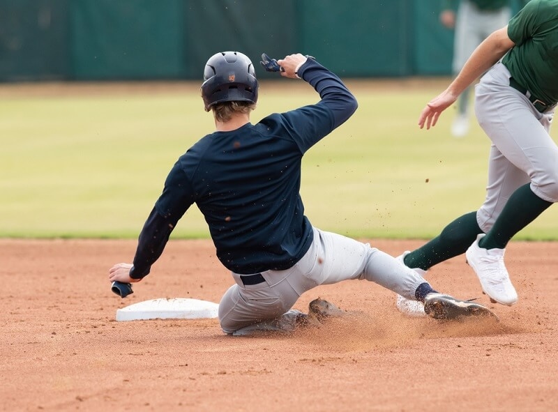 Baseball Players Base Stealing