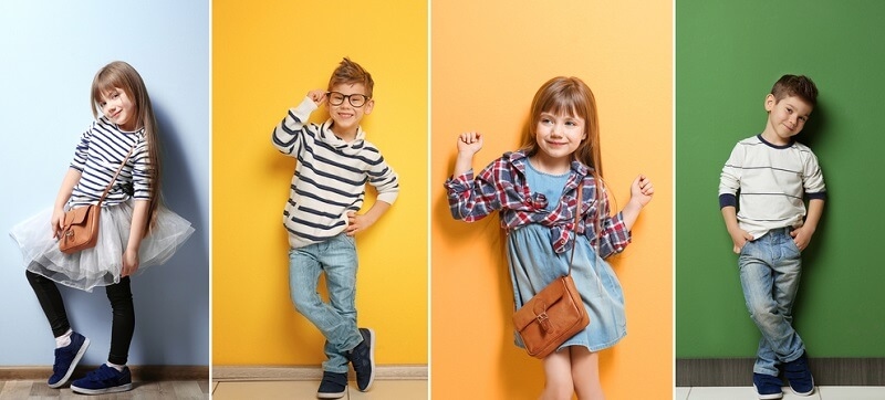 Collage of stylish cute kids posing on color background