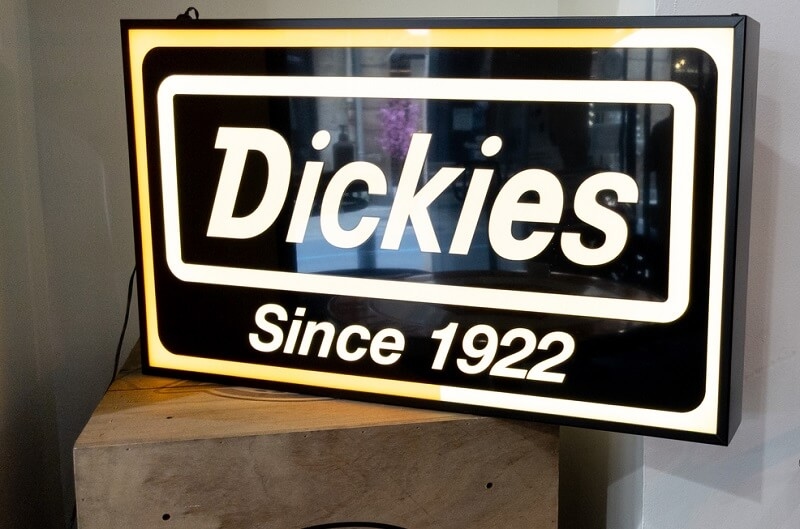 Dickies logo brand and sign text on store wall