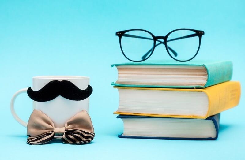 stack of books and glasses