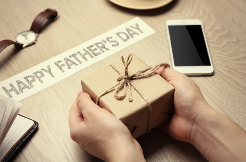 Happy Father's Day inscription with gifts