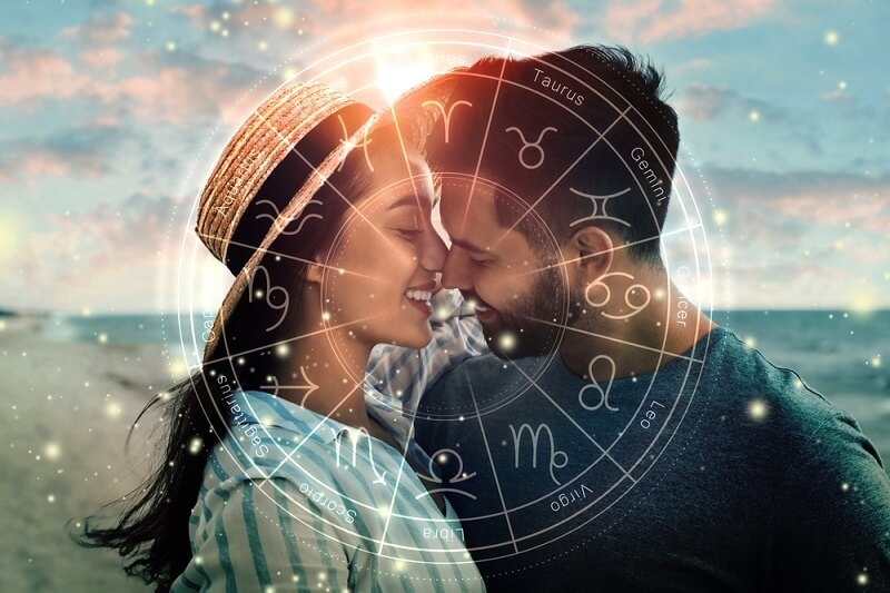 Loving couple with zodiac wheel