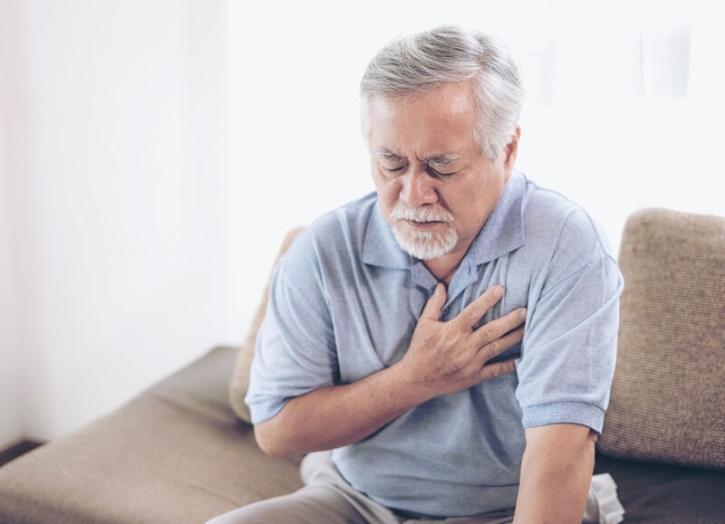 Senior man having pain in his chest