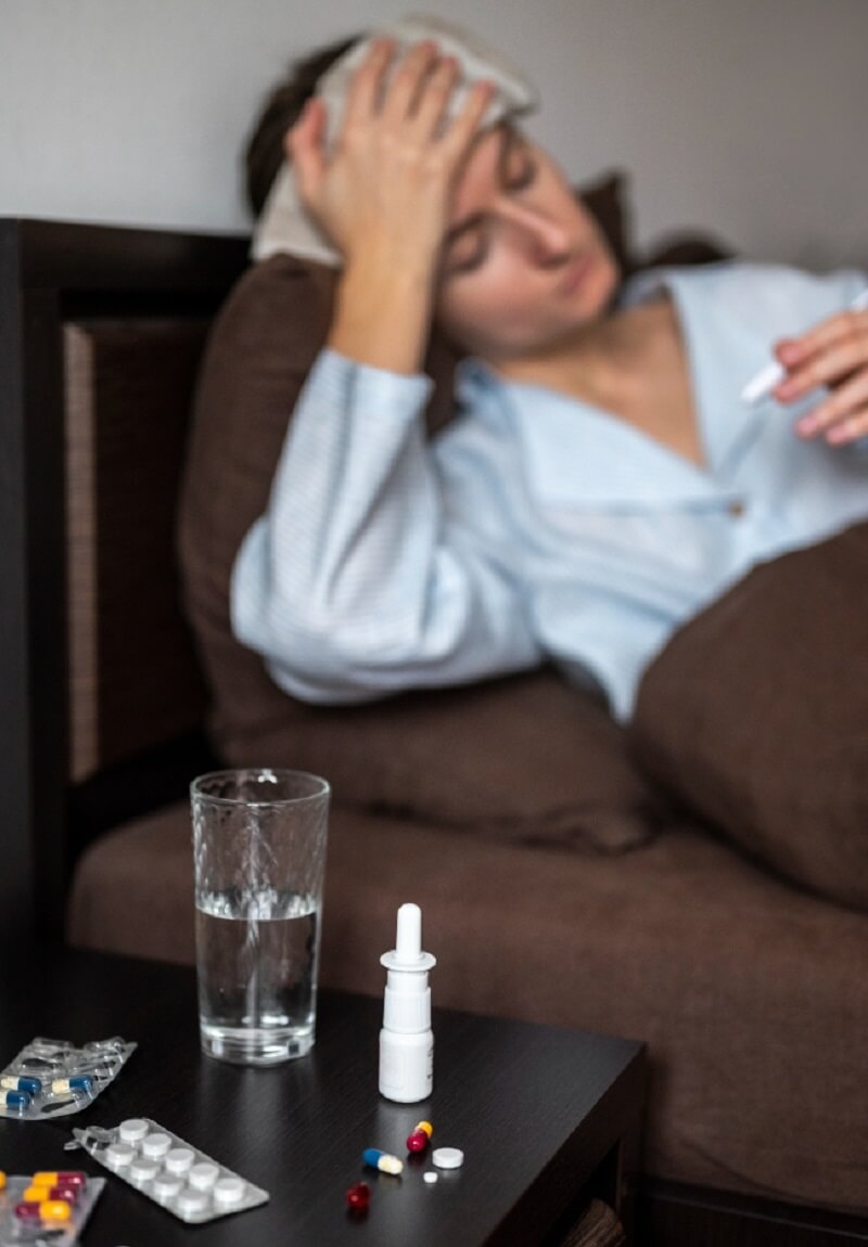 Sick woman taking Medication