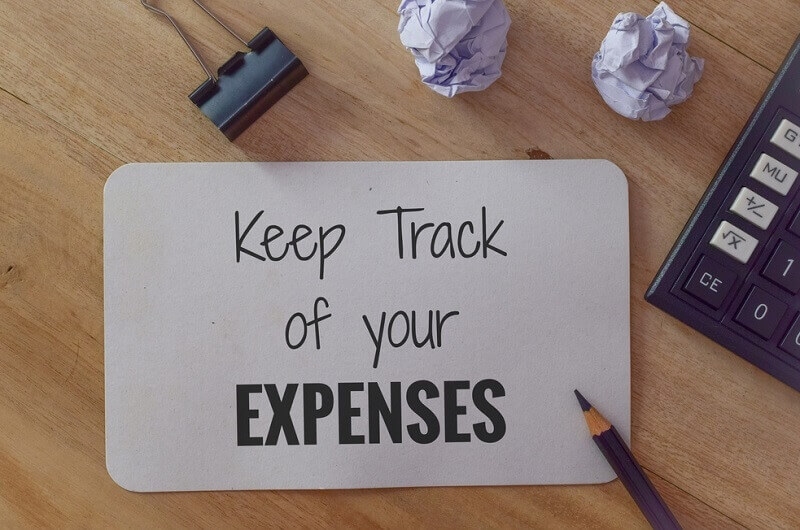 Track Your Expenses written on note