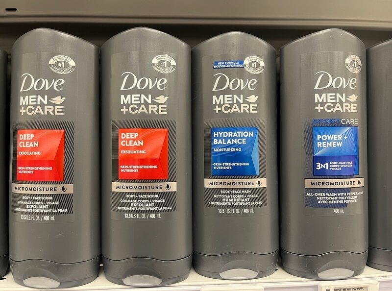 Various Dove Men Care anti-perspirant sticks on a store shelf