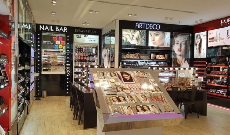 Various cosmetic and beauty products on the shelf in shopping mall