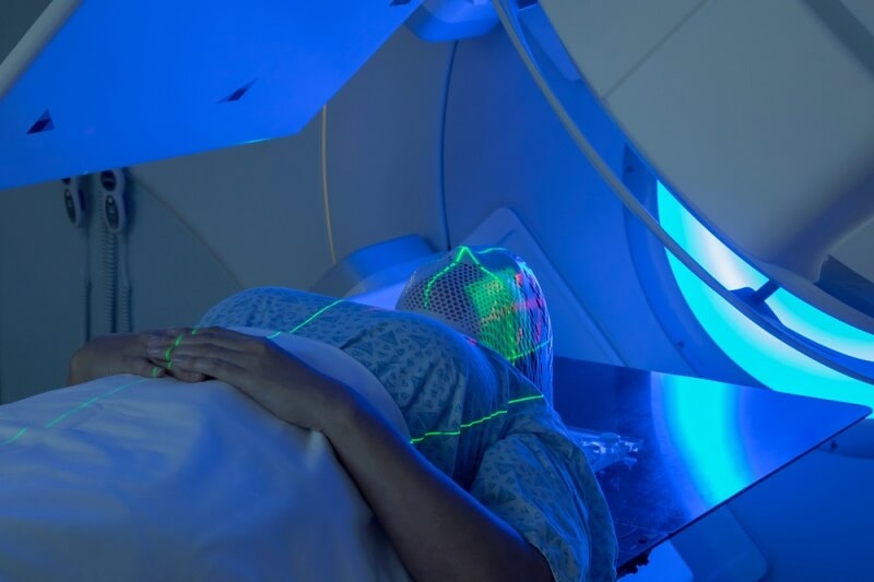 Woman receiving Radiation Therapy for Cancer Treatment