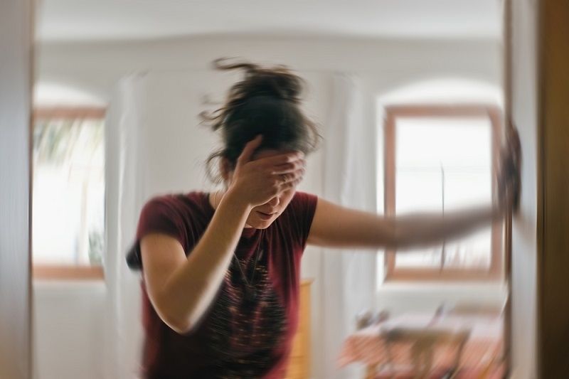 woman suffering from dizziness