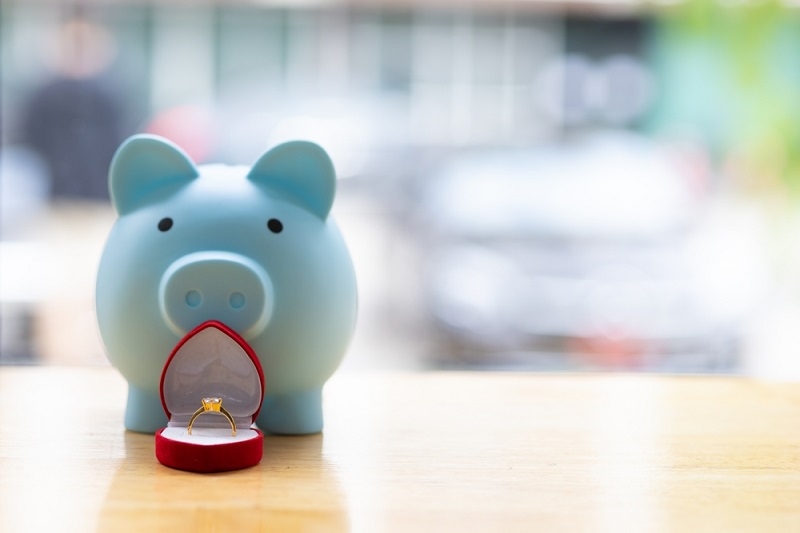 Piggy bank and engagement ring