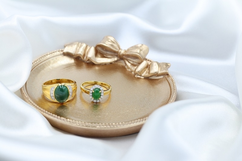 Emerald and gold wedding rings