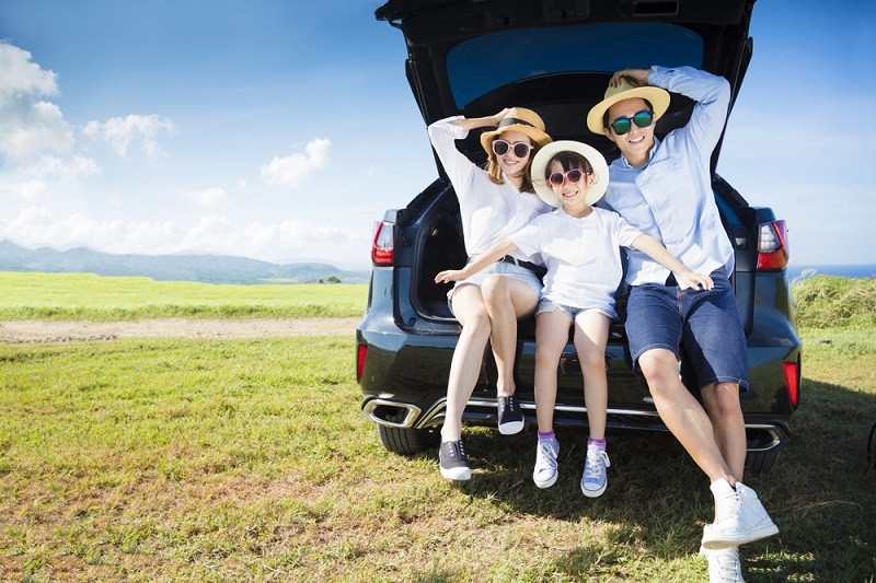 happy family enjoying road trip