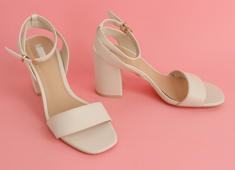 pair of women's sandals with square toes and high heels