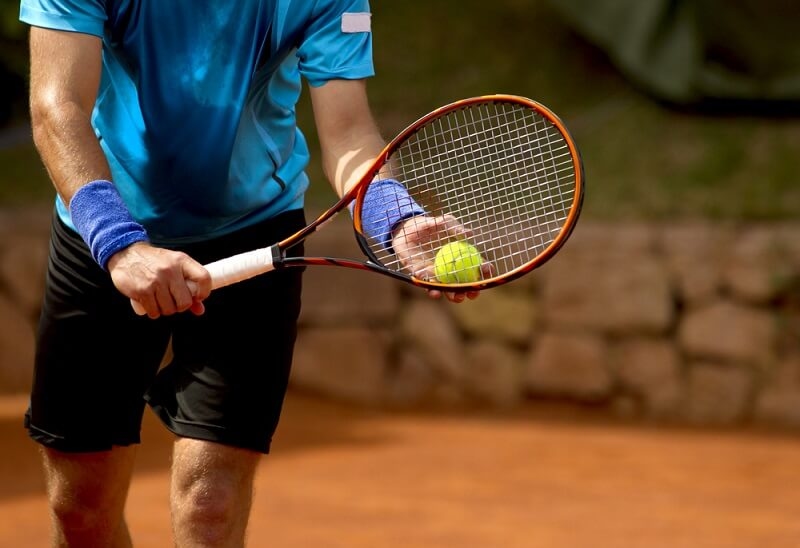 Man playing tennis