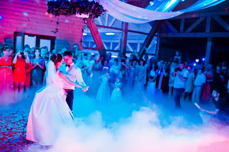 Wedding dance in restaurant with varioius lights