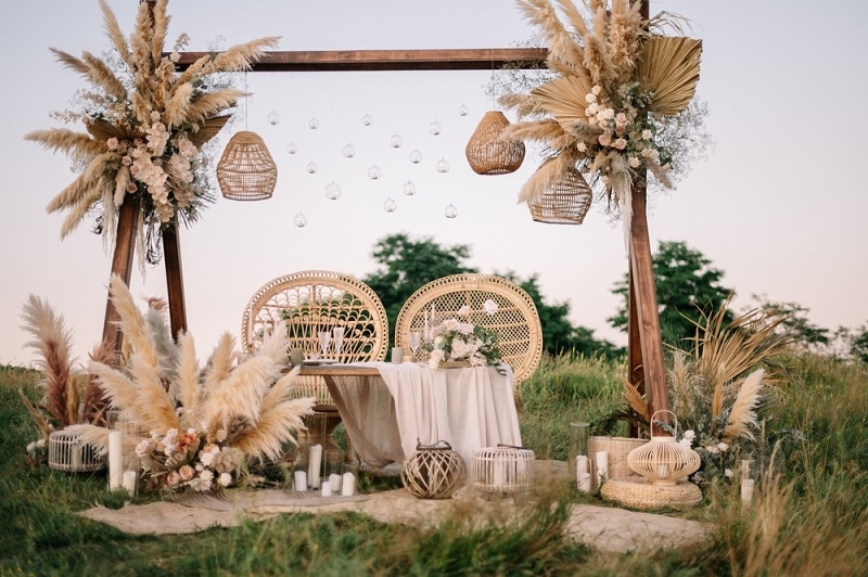 Wedding set up in boho style with pampas grass and greenery