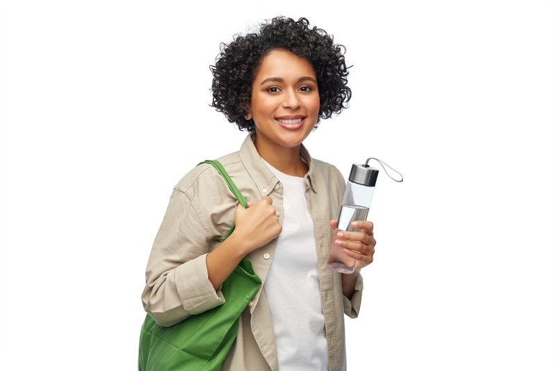 happy smiling woman with water bottle