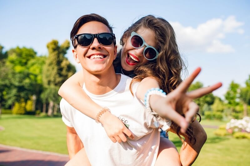 young couple having fun in park