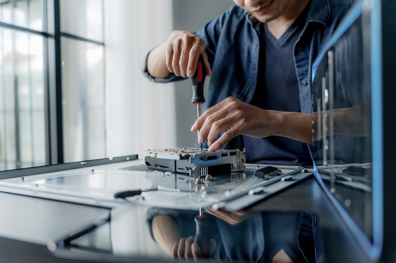 Technician repairing Computer pc