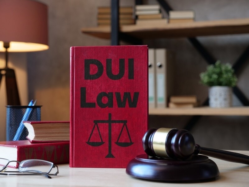dui law book and hammer on a table