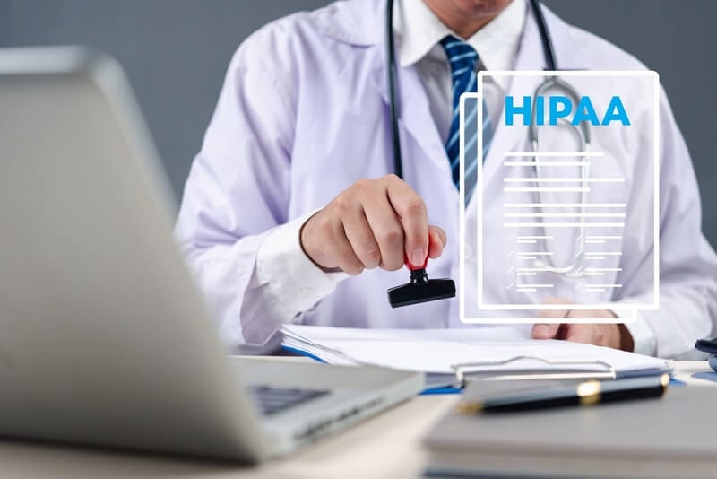Doctor stamping on HIPPA compliance certificate 