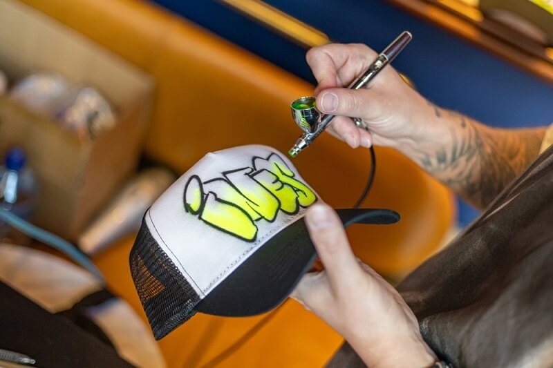 airbrush stenciling on cap 