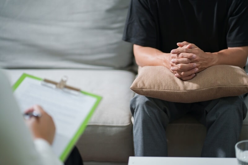 man consulting with doctor regarding anxiety