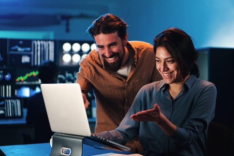 woman taking help from man in ledger finance in blockchain