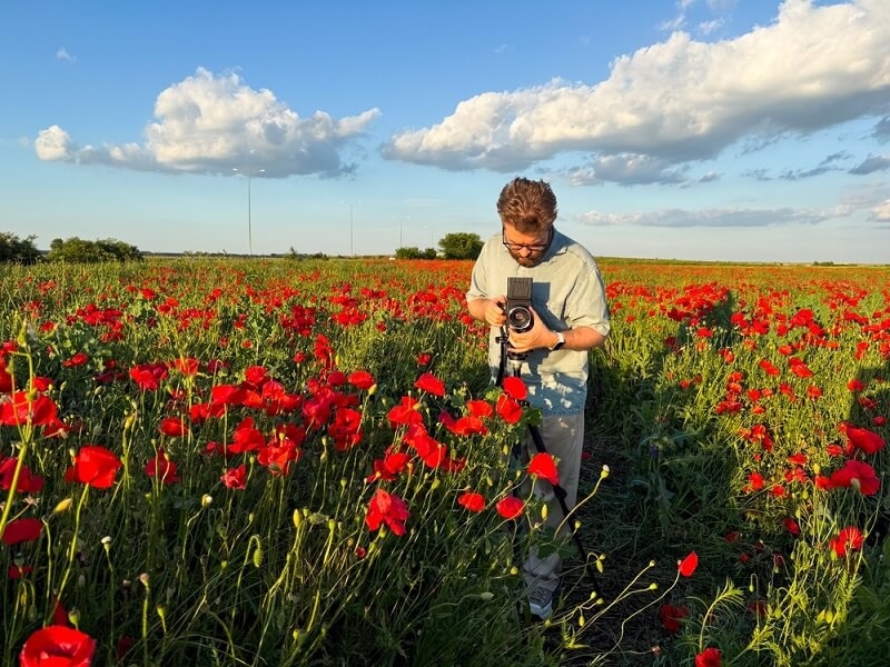 cameraman clicking pictures in autumn 
