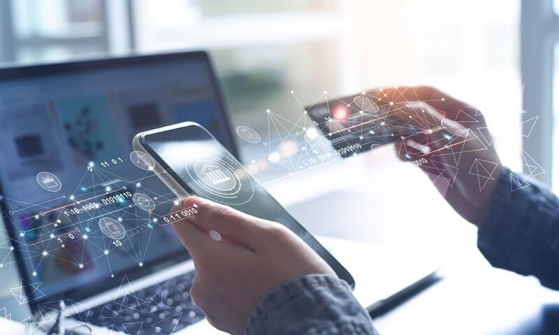 man using online banking with card details