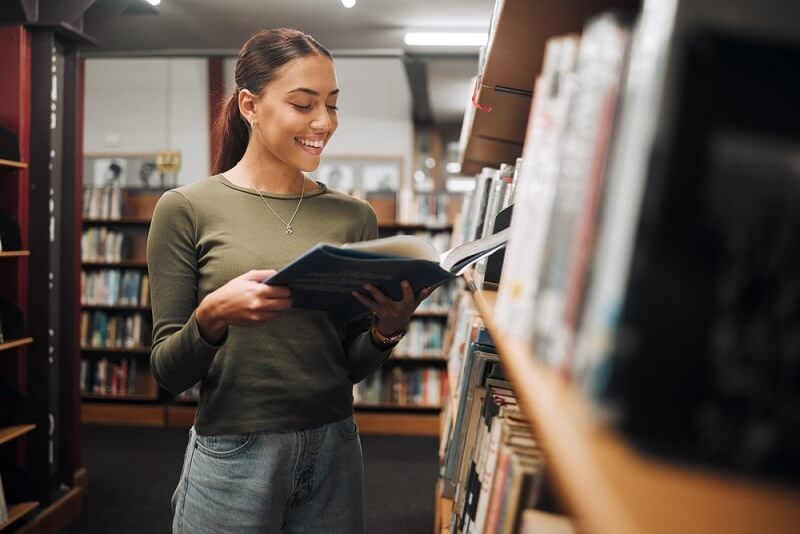 woman reading book in busy schedule life 