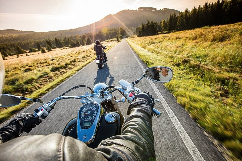 biker riding bike in mountains