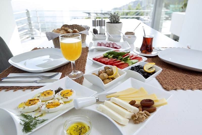 Rich and delicious brunch on white wood table