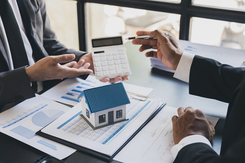 businessman showing small business insurance options