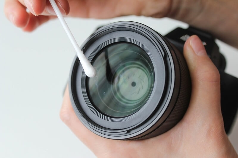 cleaning camera lens with bid