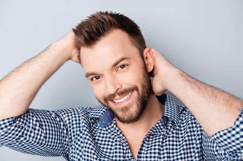 man with fade hair and beard look 