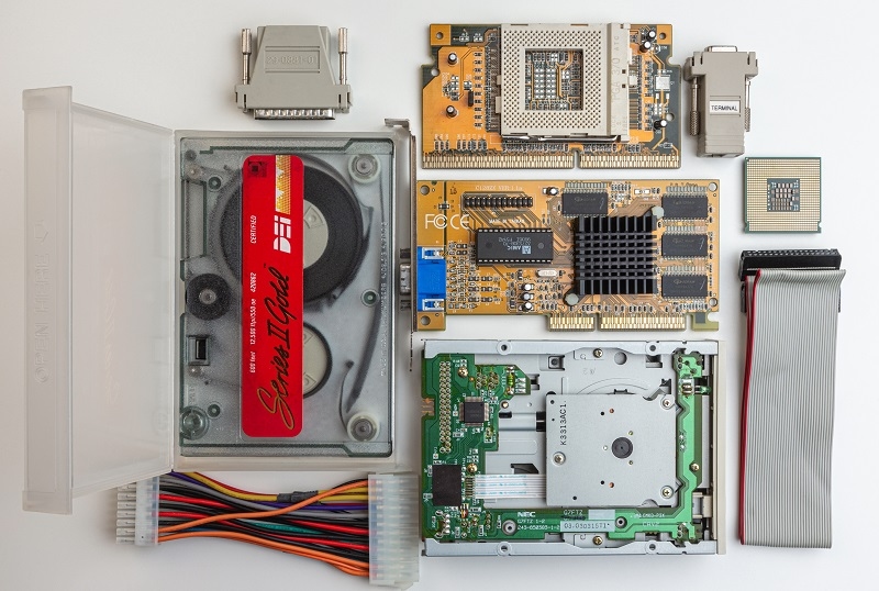  Top View of Vintage Computer Hardware Components Disassembled in Neat Layout