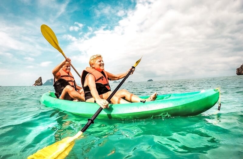 couple enjoying seakayaking in ocean