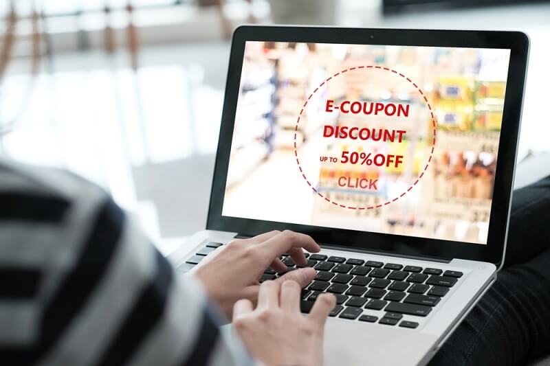 woman using e-coupon up to great discounts