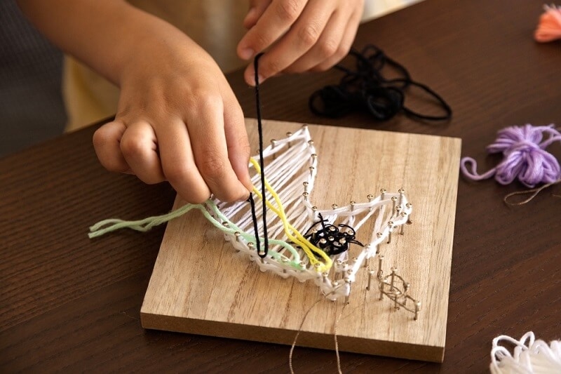 teen using simple thigs for crafting