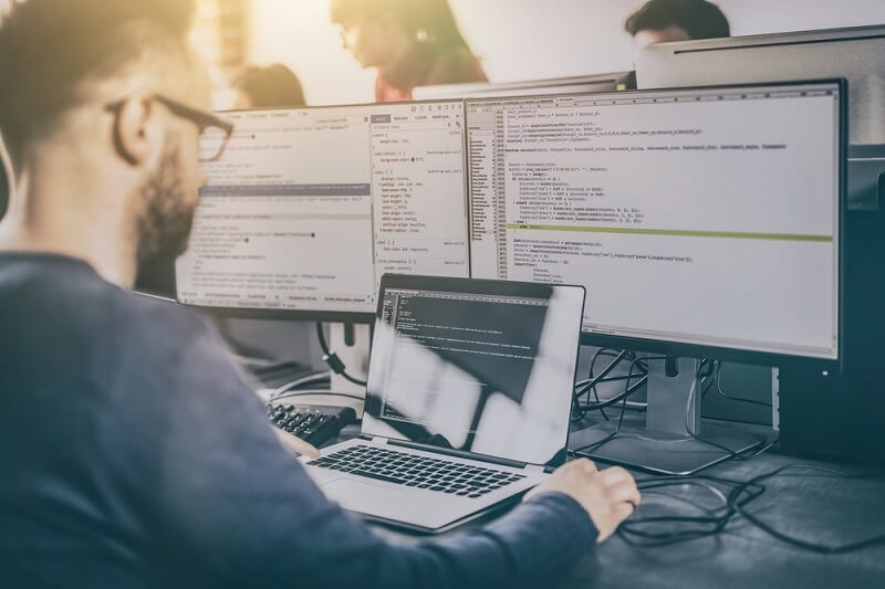 developer working on web app development on two machine simaltaneously