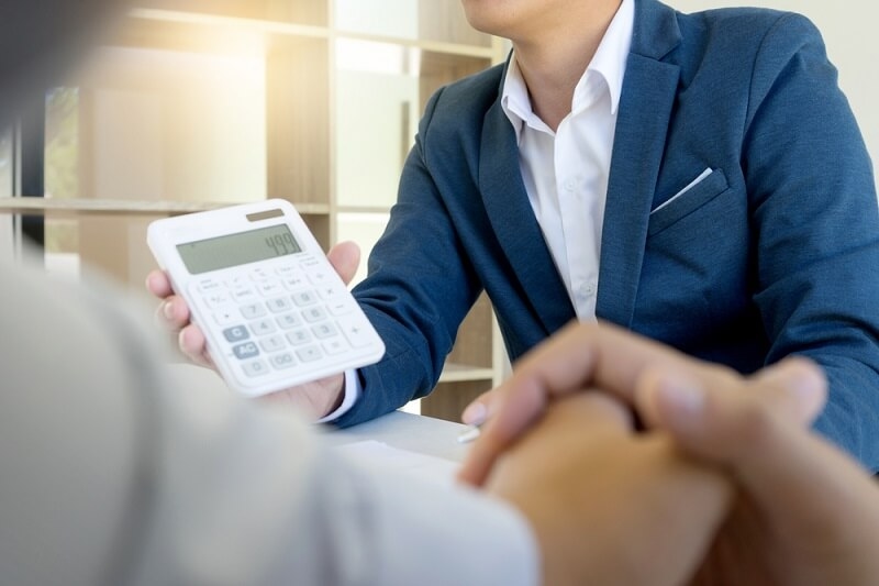 agent showing insurance cost