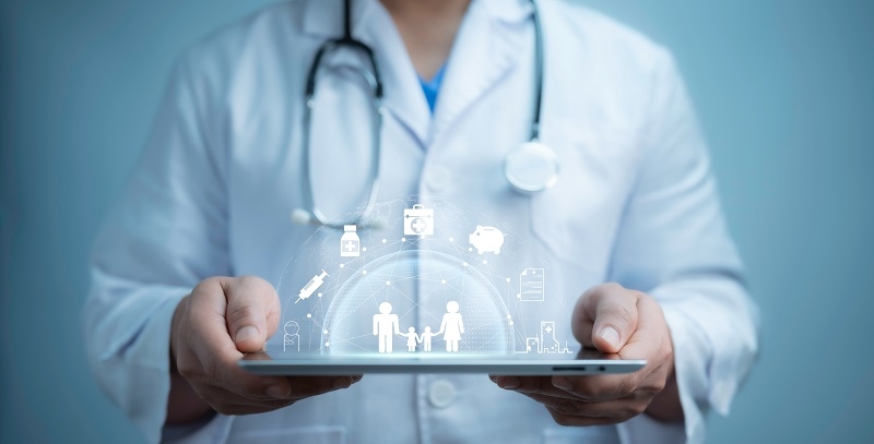 A medical worker using tablet with virtual health care icons, medical technology background, health insurance business. Health Insurance,