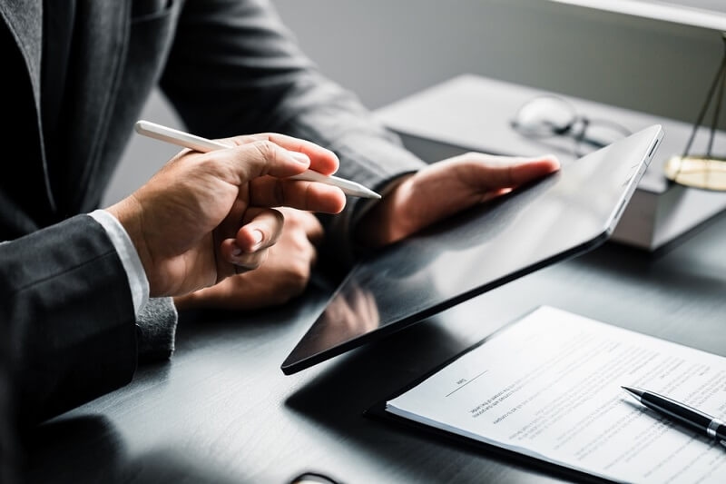businessman reading financial law policy