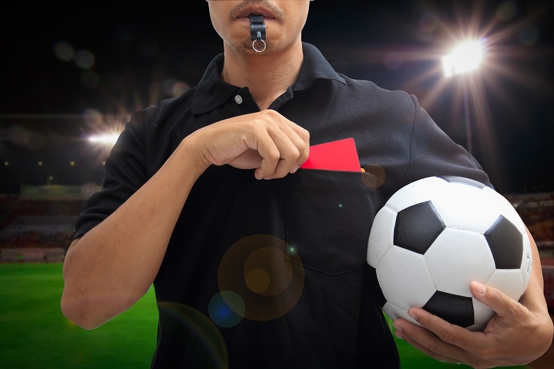 The referee gave a red card for the player in stadium
