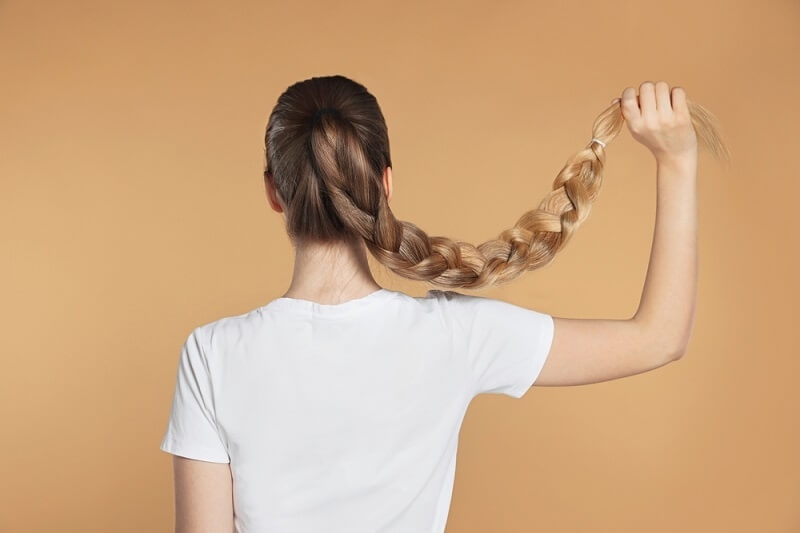 woman showing her braided ponytail