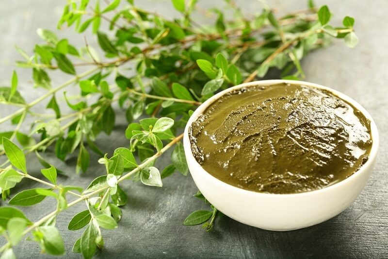 henna sacred dye in bowl for dying hair
