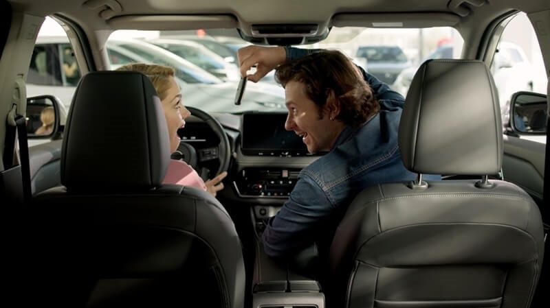 happy-couple-with-new-import-car