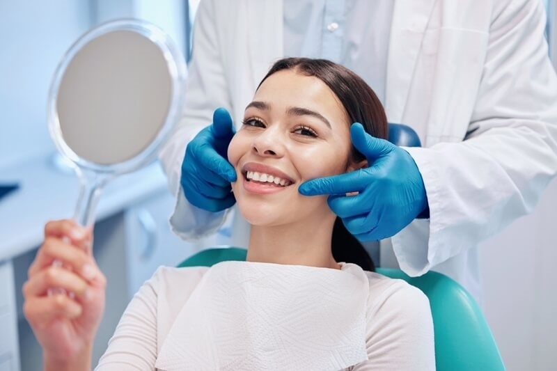 happy-girl-with-dental-insurance